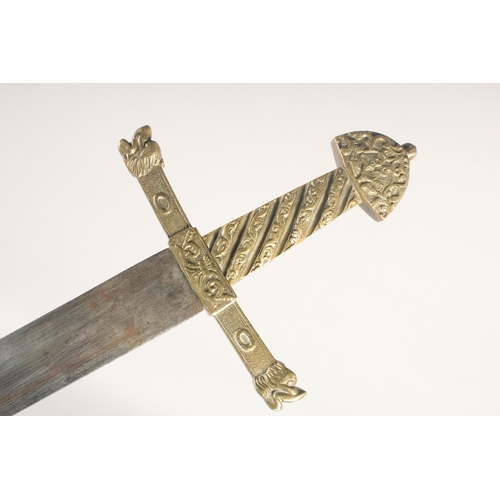 170 - A THEATRICAL REPLICA OF A KNIGHTLY SWORD, early 20th century, straight edged pointed 28.5 in blade, ... 