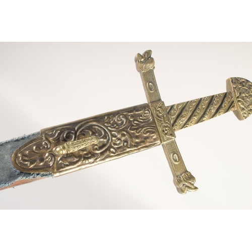 170 - A THEATRICAL REPLICA OF A KNIGHTLY SWORD, early 20th century, straight edged pointed 28.5 in blade, ... 