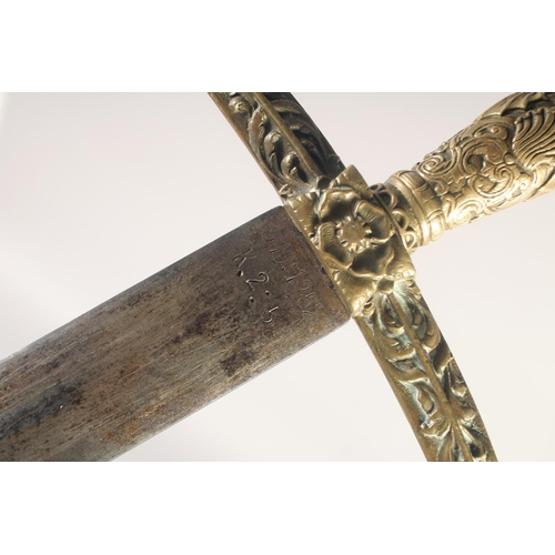 174 - A THEATRICAL REPLICA OF A KNIGHTLY SWORD, early 20th century, straight pointed 33.5 in blade, cast b... 