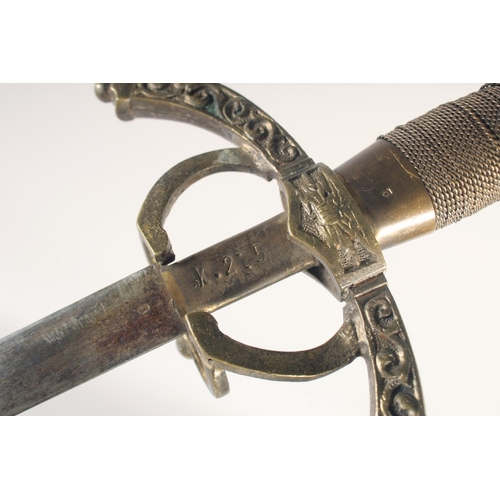 175 - A REPLICA OF A RAPIER, early 20th century, narrow double edged 32in blade, brass hilt, downturned qu... 