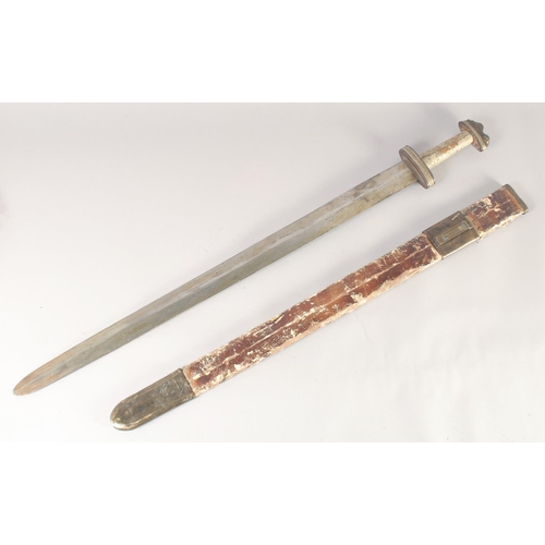 178 - A REPLICA OF A VIKING SWORD, early 20th century, wide straight pointed 33in blade, hilt with leather... 