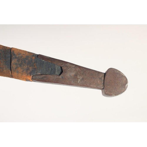 180 - A THEATRICAL REPLICA OF AN IRON AGE SWORD, early 20th century, wide tapering double fullered pointed... 