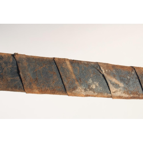 180 - A THEATRICAL REPLICA OF AN IRON AGE SWORD, early 20th century, wide tapering double fullered pointed... 