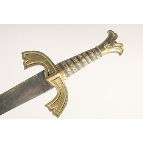 181 - A THEATRICAL REPLICA OF A GERMAN KNIGHTLY SWORD, early 20th century, wide tapered double edged blade... 