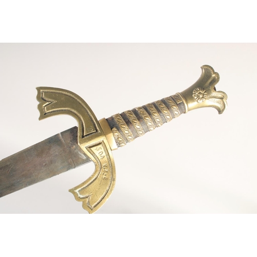 181 - A THEATRICAL REPLICA OF A GERMAN KNIGHTLY SWORD, early 20th century, wide tapered double edged blade... 