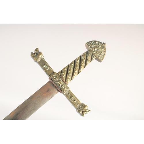 189 - A REPLICA OF A KNIGHTLY SWORD, early 20th century, straight edged pointed 36in blade, brass crucifor... 