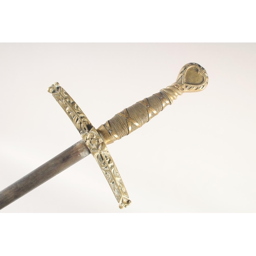 192 - A REPLICA OF A KNIGHTLY SWORD, early 20th century, slender fullered straight pointed 29in blade, cas... 