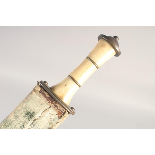 194 - A REPLICA OF A VIKING BROAD SWORD, early 20th century, wide tapering blunt 37 in blade white horn gr... 