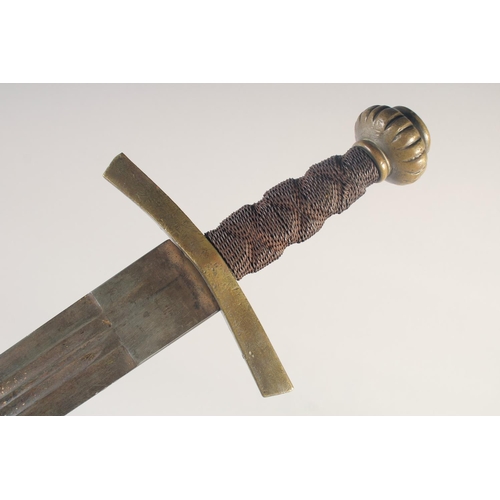 199 - A REPLICA OF A GERMAN EXECUTIONER'S SWORD, early 20th century, wide 31.5