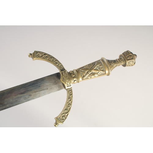 201 - A THEATRICAL REPLICA OF A KNIGHTLY SWORD, early 20th century, straight pointed 34in blade, cast bras... 