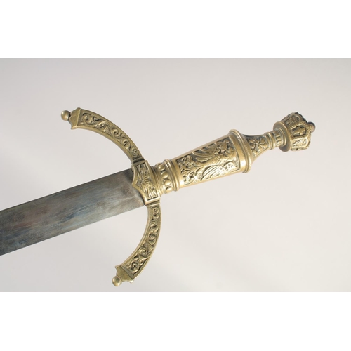 201 - A THEATRICAL REPLICA OF A KNIGHTLY SWORD, early 20th century, straight pointed 34in blade, cast bras... 