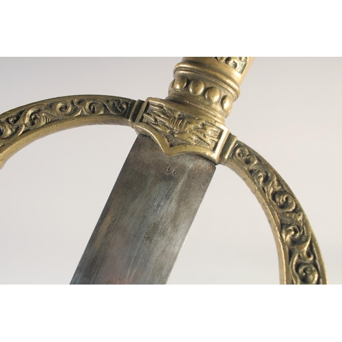 201 - A THEATRICAL REPLICA OF A KNIGHTLY SWORD, early 20th century, straight pointed 34in blade, cast bras... 