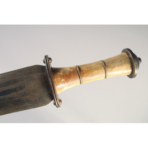 203 - A THEATRICAL REPLICA OF A VIKING BROAD SWORD, early 20th century, wide tapering blunt 37 in blade wh... 