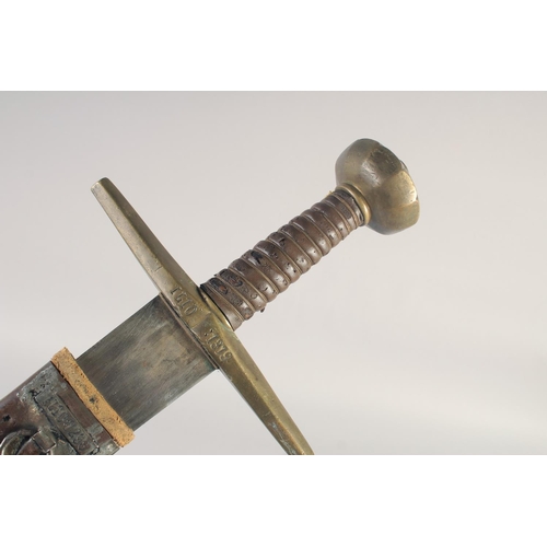 205 - A REPLICA OF A KNIGHTLY SWORD, early 20th century, wide tapering pointed 31.5 in blade, hilt with st... 