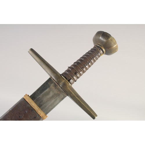 205 - A REPLICA OF A KNIGHTLY SWORD, early 20th century, wide tapering pointed 31.5 in blade, hilt with st... 