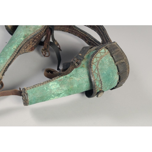 218 - A PAIR OF AMERICAN INDIAN/CIVIL WAR PERSONAL POMMEL HOLSTERS, late 19th century, green leather, with... 