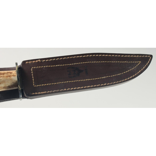 22 - A MUELA SARRIO SPANISH KNIFE, with an antler handle, 13