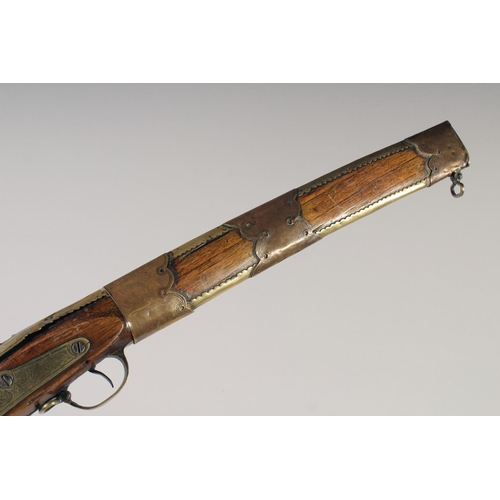 220 - A RARE INDIAN TORODAR FLINTLOCK CARBINE, early 19th century, round 10in barrel with brass ring at mu... 