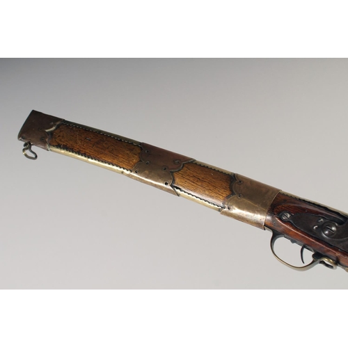 220 - A RARE INDIAN TORODAR FLINTLOCK CARBINE, early 19th century, round 10in barrel with brass ring at mu... 