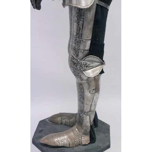 229 - A GOOD 19th CENTURY FULL ARMOUR, deeply etched all over with foliate scrolls and mythical beasts on ... 