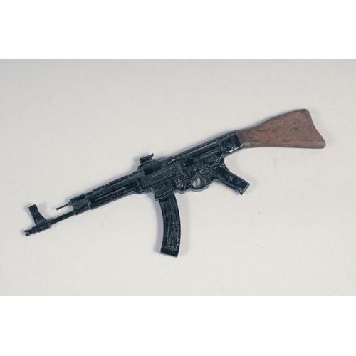 230 - THREE MODEL 1/4 SCALE MACHINE GUNS, a Sten gun, an MG 42 and an AK 47, made of wood and metal, the l... 