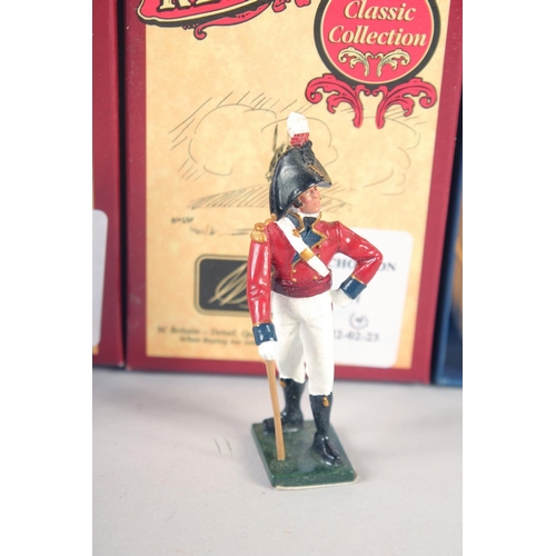 261 - A PAIR OF FRENCH AND ENGLISH CAST SOLDIERS BOXED, and a pair of red coats boxed, (4).