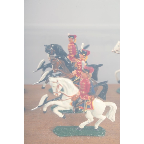 278 - A DIECAST SET, of twelve mounted cavalry, in a Perspex case.