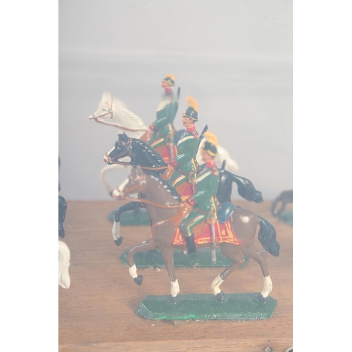 278 - A DIECAST SET, of twelve mounted cavalry, in a Perspex case.