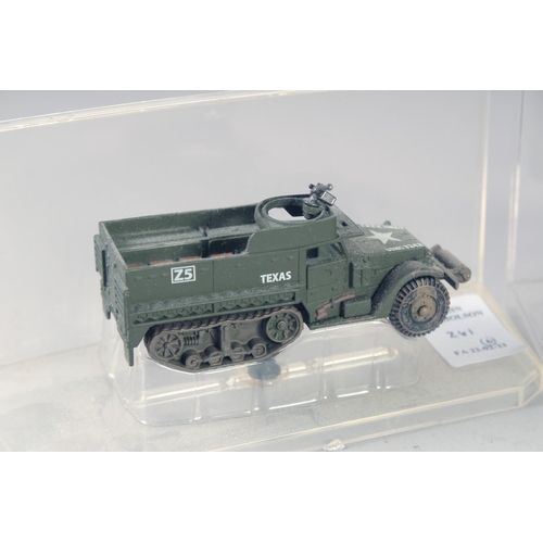 281 - SIX VARIOUS DIECAST ARMORED VEHICLES, in a Perspex case.