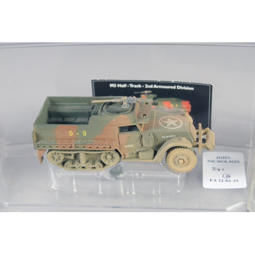 281 - SIX VARIOUS DIECAST ARMORED VEHICLES, in a Perspex case.