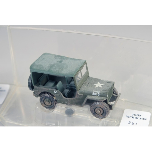 281 - SIX VARIOUS DIECAST ARMORED VEHICLES, in a Perspex case.