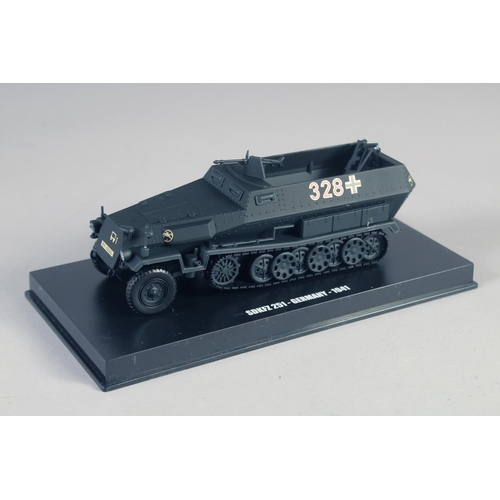 284 - FOUR VARIOUS ARMORED VEHICLES, boxed.