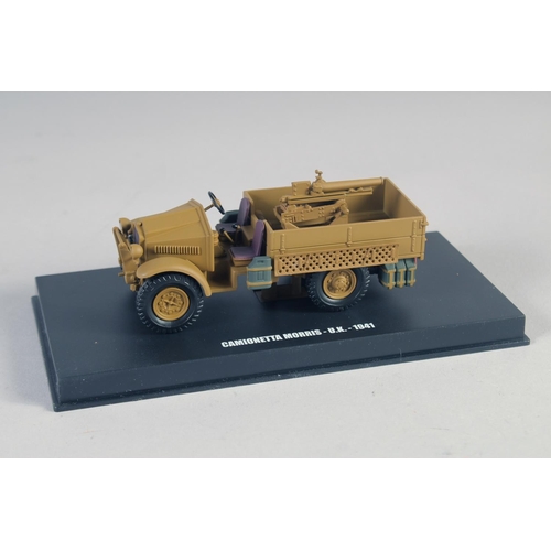 284 - FOUR VARIOUS ARMORED VEHICLES, boxed.