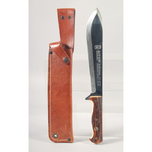 30 - AN AITOR SURVIVAL 21 8.75 STAINLESS STEEL KNIFE, with antler handle in a leather sheath.