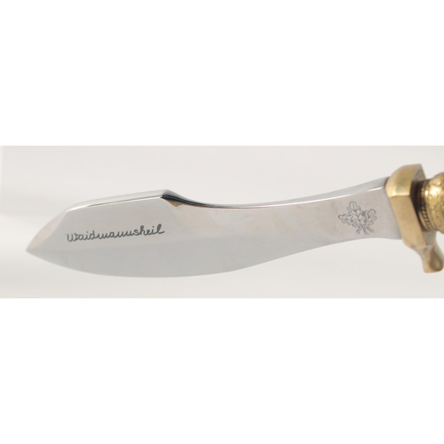 31 - A WEIDMANNSHEIL KNIFE, the blade engraved with a mountain goat, with brass mounts and an antler hand... 