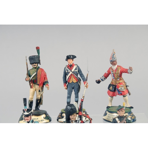 311 - A GOOD COLLECTION OF CAST AND PAINTED SOLDIERS, average height 2.75