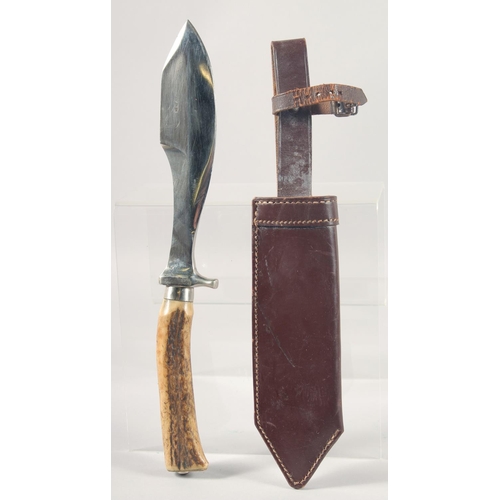 32 - A HENEJU KNIFE, with an antler handle, 13