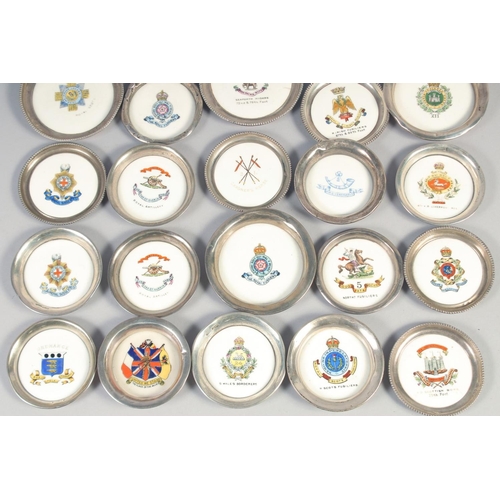 363 - A COLLECTION OF TWENTY ONE AYNSLEY PORCELAIN AND SILVER STANDS, with military coat of arms in a leat... 