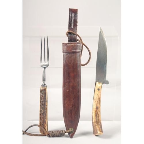 37 - AN OLD KNIFE AND FORK, with antler handles, 8