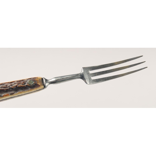 37 - AN OLD KNIFE AND FORK, with antler handles, 8