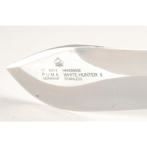 38 - A PUMA WHITE HUNTER II 6377 PUMASTER STEEL, with antler handle, 10.5