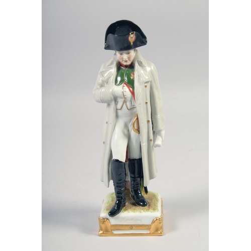 384 - A PORCELAIN FIGURE OF ADMIRAL LORD NELSON AN NAPOLEON, 8.5