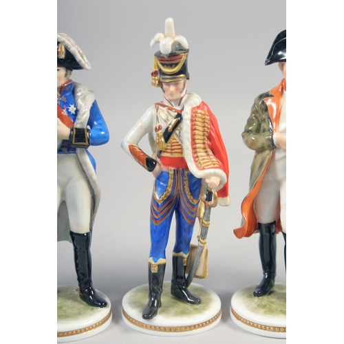 386 - KAISER, A SET OF FOUR PORCELAIN FIGURES, Napoleon, Lancer, Key, Tunoy, hand painted, colour bearer, ... 