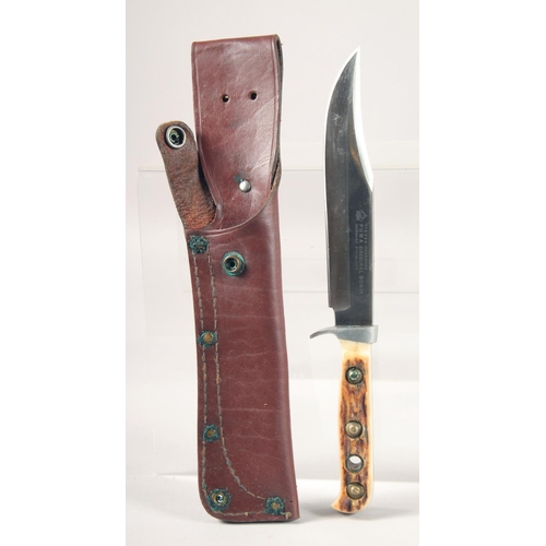 39 - A PUMA ORIGINAL BOWIE KNIFE 116396, with stainless steel blade and antler handle, 10.5