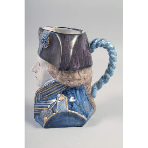 398 - A DELFT POTTERY MASK JUG, 