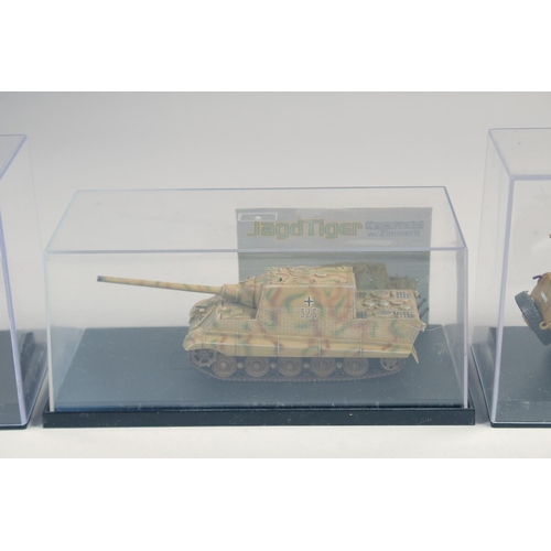 426 - ATLAS MULTIPLE GUN MOTOR CARRIAGE MI6 and three other tanks in Perspex cases.