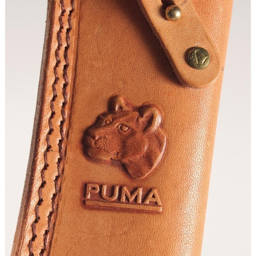 45 - A PUMA WHITE HUNTER KNIFE 6377, with antler handle in a leather sheath, 10