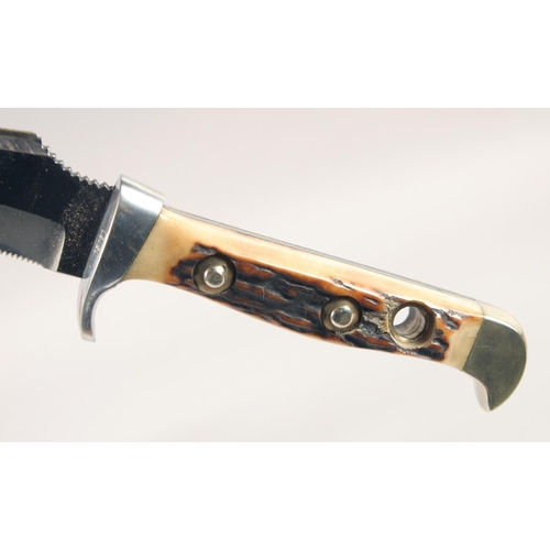 47 - THE 637 PUMA-SKINNER KNIFE WITH SUPER KEEN CUTTING STEEL, with antler handle, in a leather sheath, 9... 