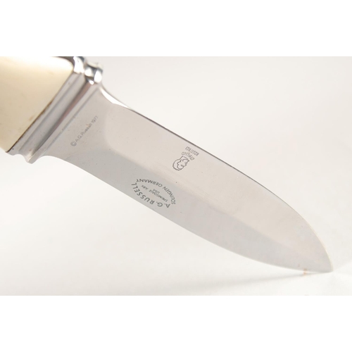 51 - A.G. RUSSELL SOLINGEN, a knife with two-tone handle. 7.5