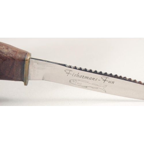 65 - A FISHERMANS FUN KNIFE SOLINGEN, with brass and wooden handles.